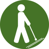 Dieses Piktogram zeigt eine Person mit Blindenstock und steht im Projekt für die Bedürfnisse von blinden Menschen.
